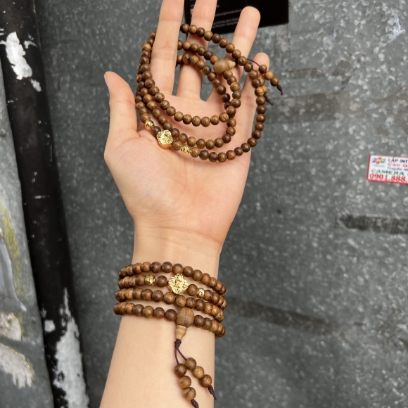 Vòng trầm hương 108 6 ly mix vàng